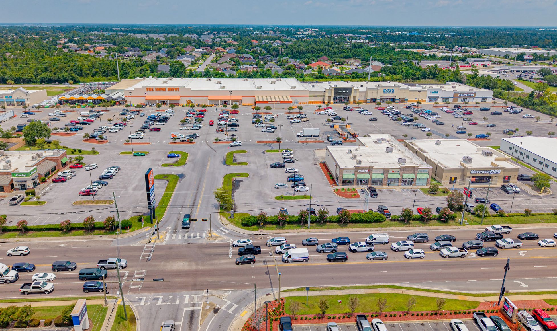 Aerial view of Panama City Center's storefronts and parking field