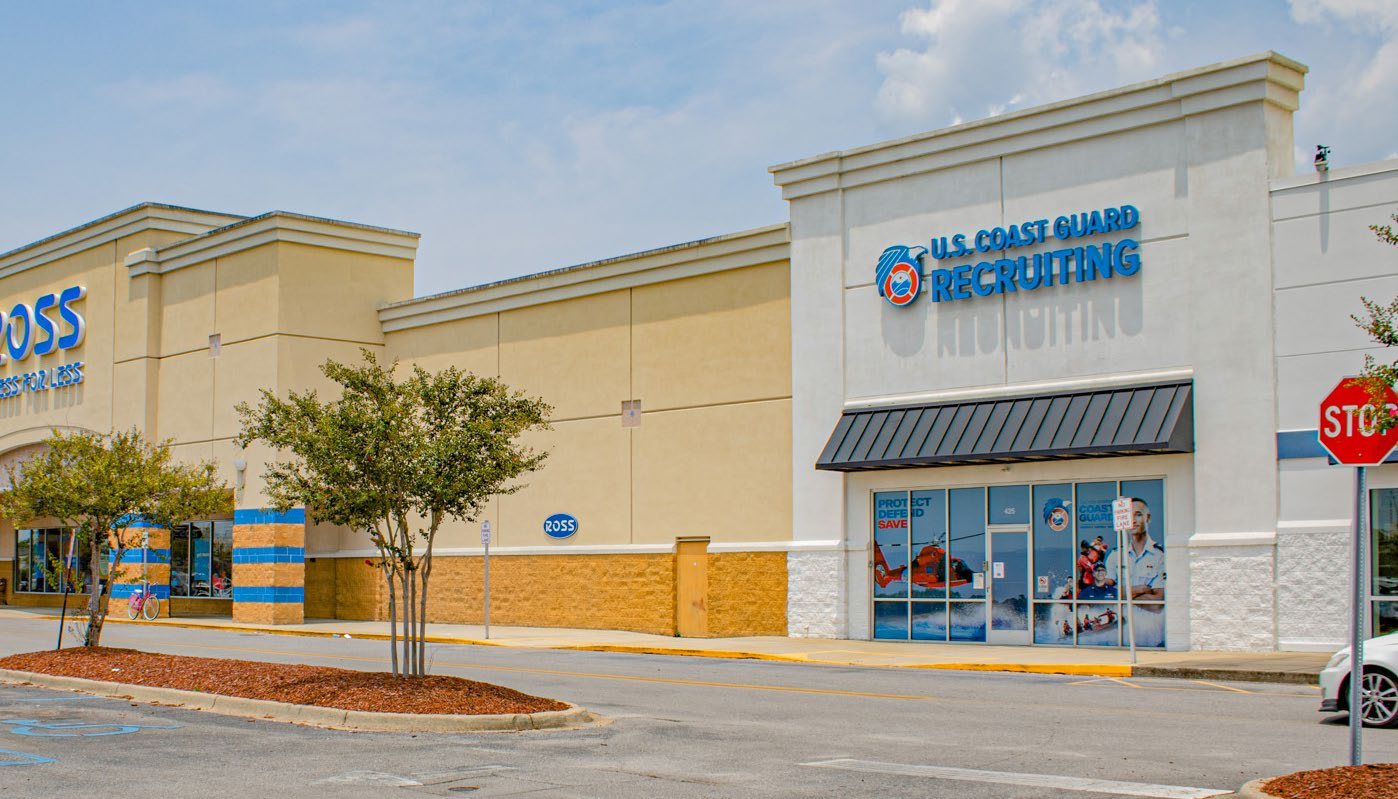U.S. Coast Guard Recruiting suite alongside the Ross storefront at Panama City Center